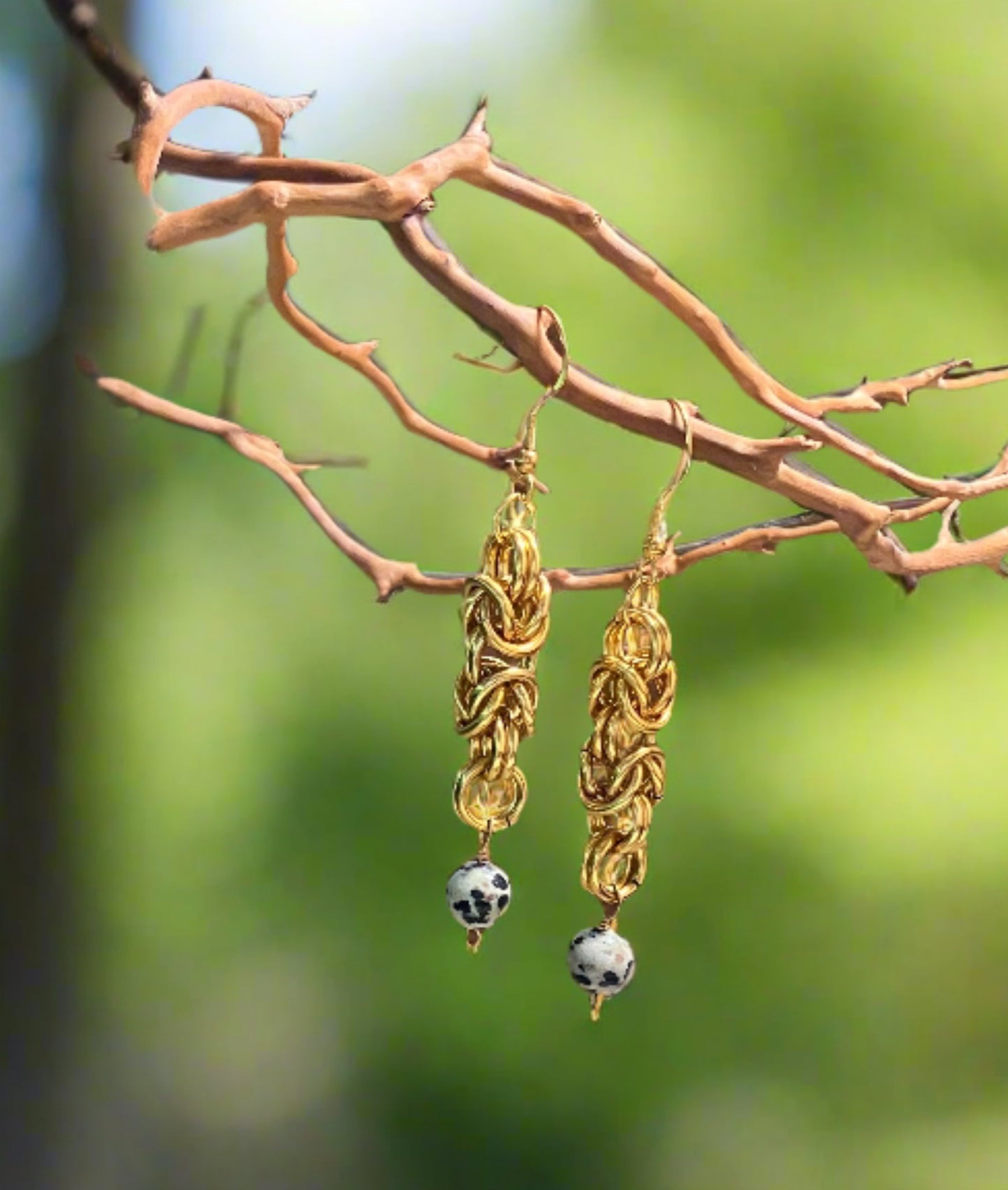 Gold aluminum rings with Dalmatian Jasper bead
