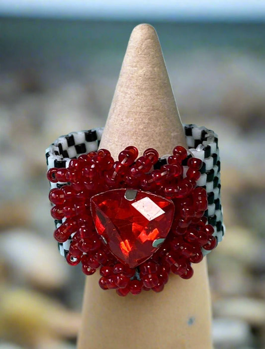 Red Triangle Crystal on a Black and White Ring