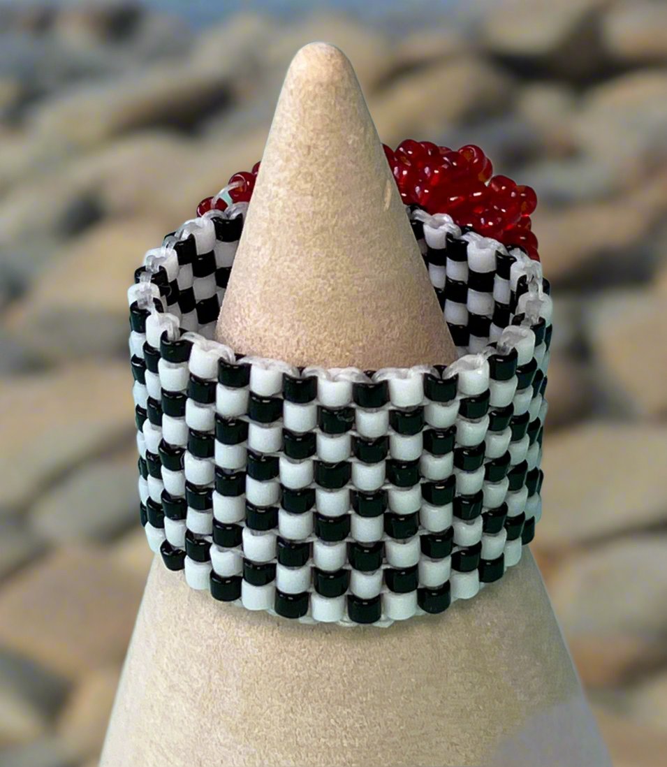 Red Triangle Crystal on a Black and White Ring